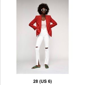 Flared rip slim fit jean